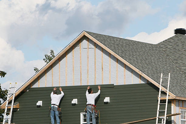 Professional Siding Contractor technician working in Newton Highlands, MA